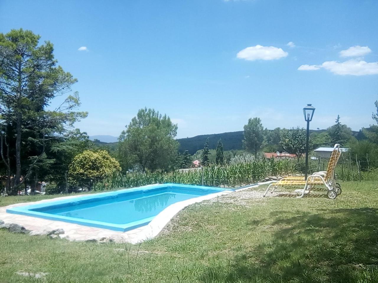 Las Acacias Refugio De Descanso La Falda Exterior foto